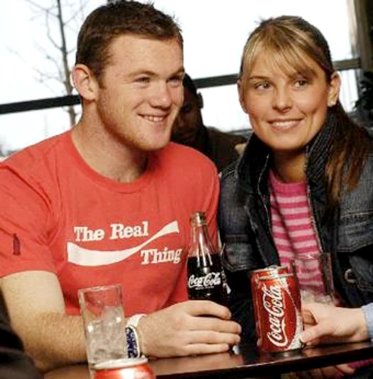
    Wayne Rooney şi soţia sa  