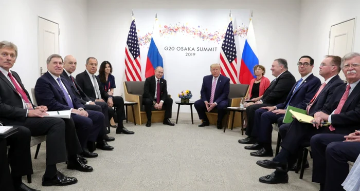 Daria Boiarskaia, în dreapta lui Vladimir Putin la reuniunea cu Donald Trump în marja summitului G20 de la Osaka FOTO EPA-EFE