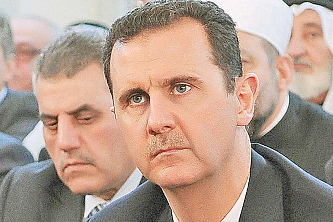 Luptele de stradă din  Damasc şi Homs continuă,  armata deschizând focul  împotriva populaţiei (Fotografii: Reuters)