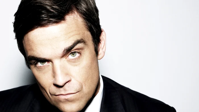 Robbie Williams, artistul britanic care l-a detronat pe Elvis!