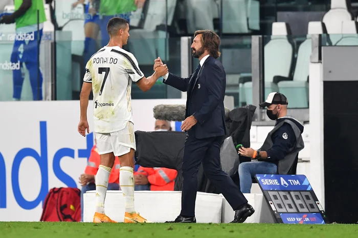 
    Andrea Pirlo și Cristiano Ronaldo  au stabilit ca portughezul să nu joace la BolognaFoto: Guliver / GettyImages  